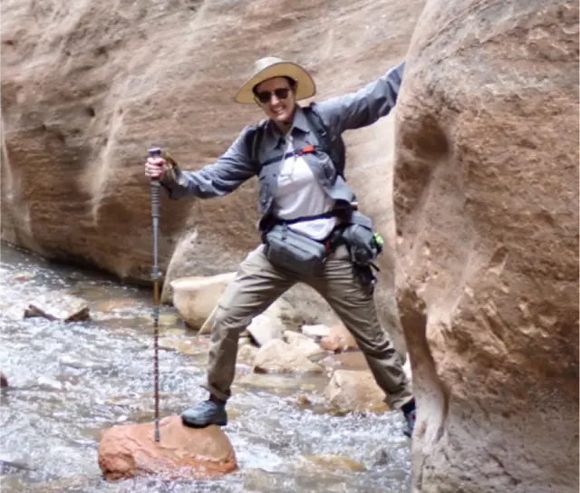 Cheyanne canyoneering up Kanarra Falls.